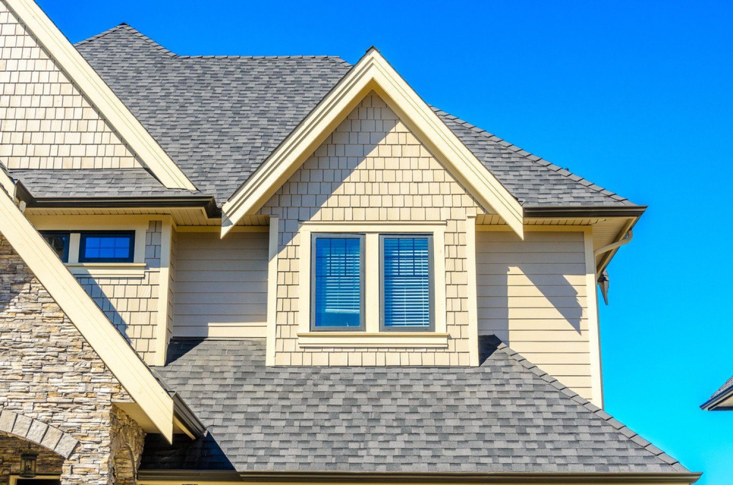 Asphalt shingle roofing on a home in Grant, MI