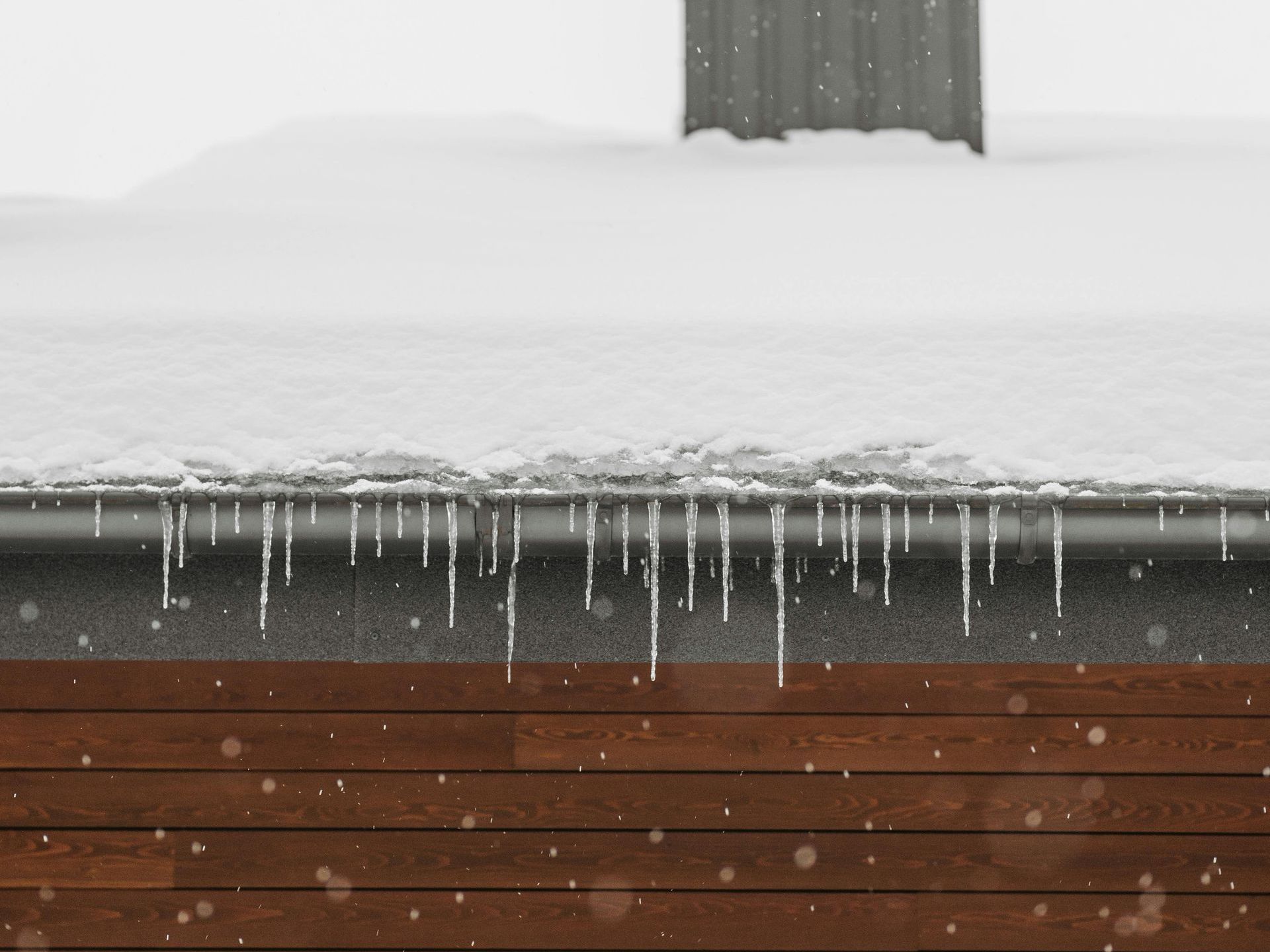 Rooftop snow removal service in Grant, MI